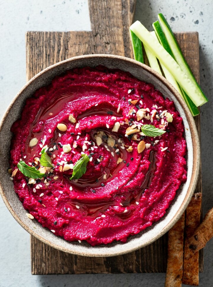 lemon beet hummus with toasted baguette and cucumber for side